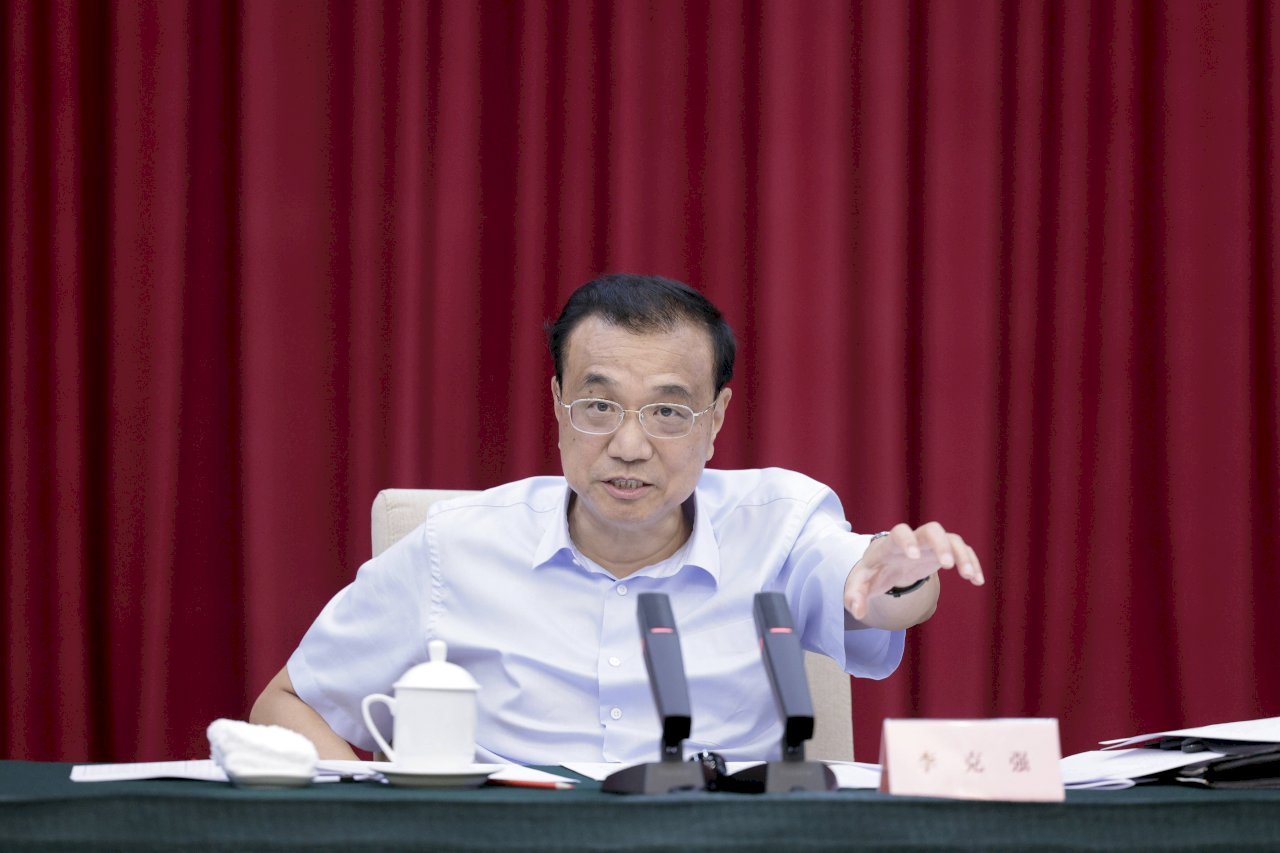 探討聯合報「李上習不下」外電稿